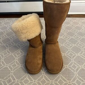Ugg classic tall boot with fur size 9. 
Worn once. No box.